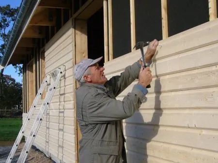 Pose du bardage en bois