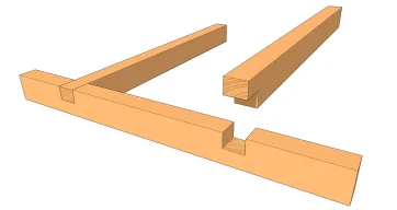 Enture à mi-bois au milieu de la pièce de support