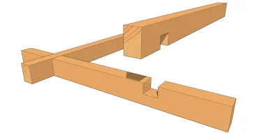 Enture à mi-bois en T sur le corps des deux pièces